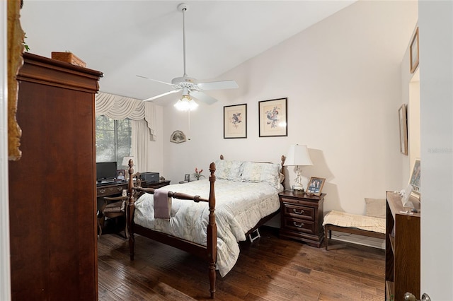 bedroom featuring ceiling fan, dark hardwood / wood-style flooring, and lofted ceiling