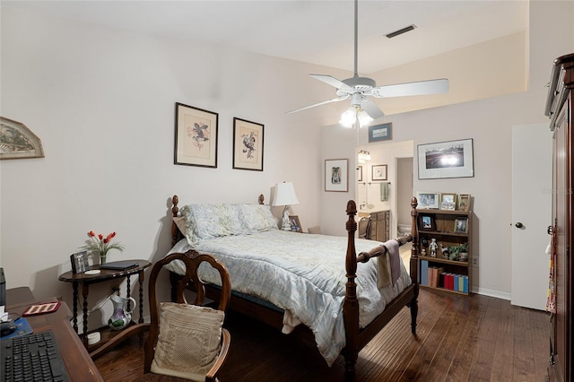 bedroom featuring lofted ceiling, ceiling fan, and dark wood-type flooring