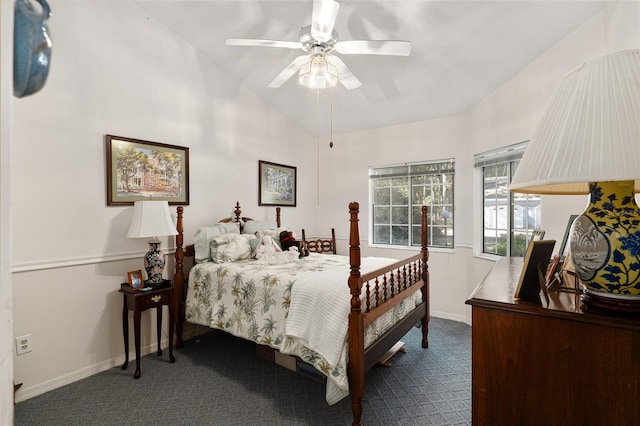 carpeted bedroom featuring ceiling fan and lofted ceiling