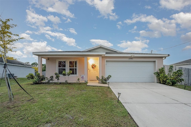 ranch-style house with a front lawn, a porch, and a garage