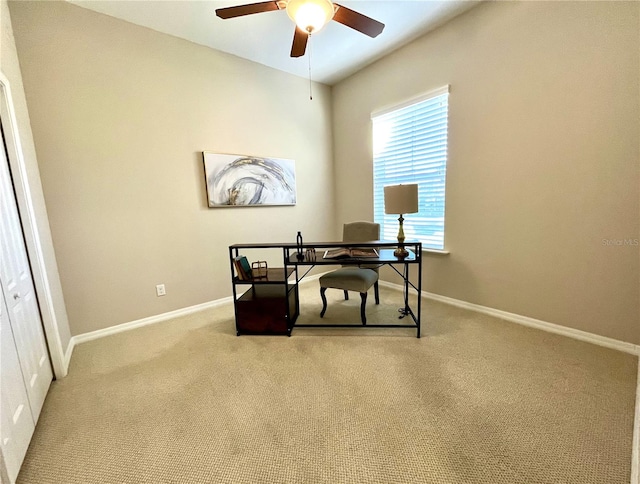 home office with light colored carpet and ceiling fan