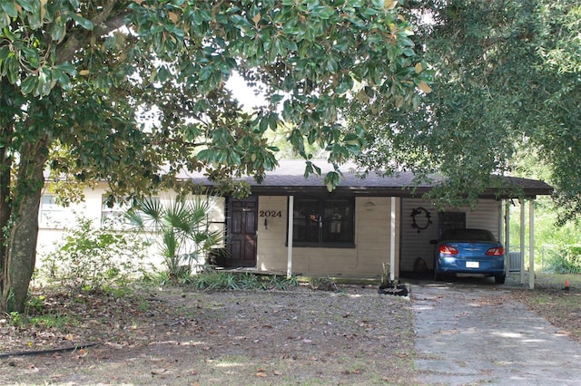 view of front of house featuring a carport