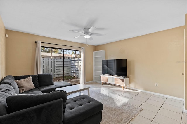 tiled living room featuring ceiling fan