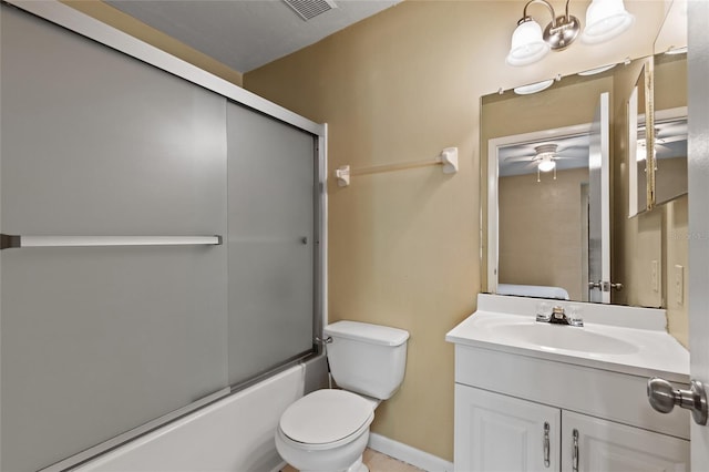 full bathroom with vanity, ceiling fan, toilet, and enclosed tub / shower combo