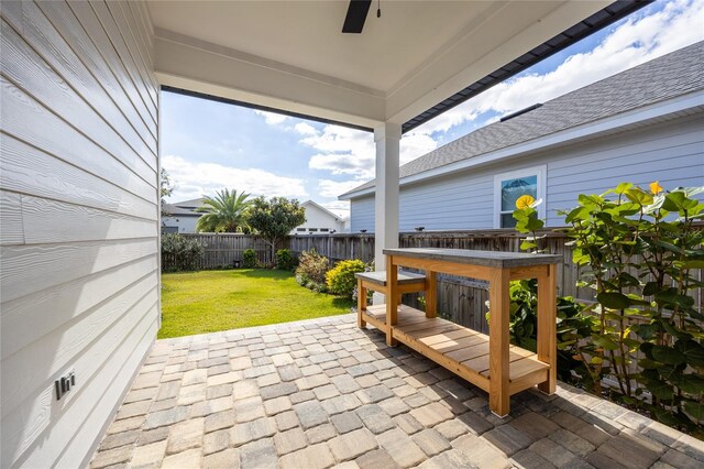 view of patio / terrace featuring ceiling fan