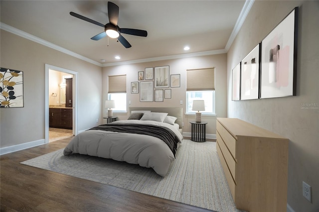 bedroom featuring hardwood / wood-style floors, ceiling fan, ornamental molding, and ensuite bathroom