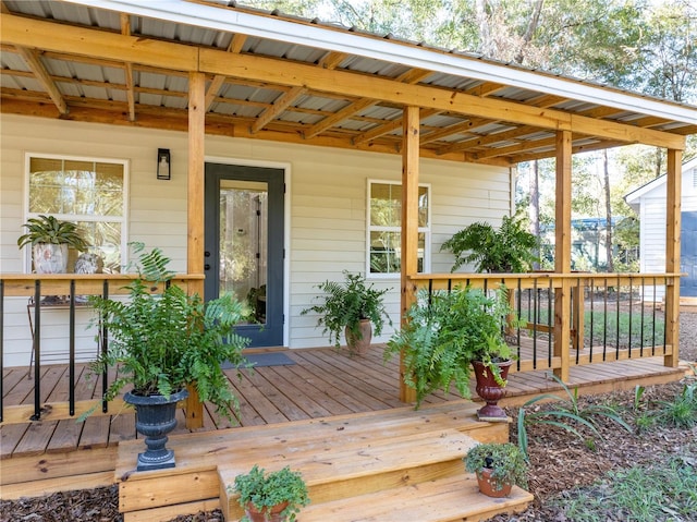 wooden deck featuring a porch