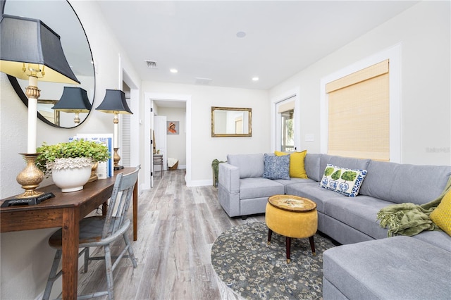 living room with hardwood / wood-style floors