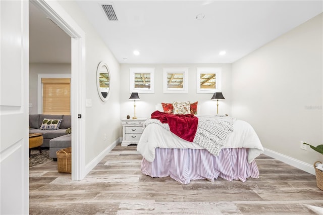 bedroom featuring light wood-type flooring