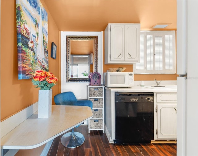 kitchen featuring white cabinetry, dark hardwood / wood-style flooring, a wealth of natural light, and dishwasher