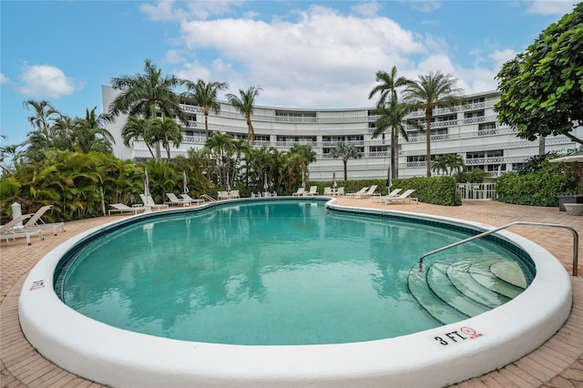 view of pool with a patio area