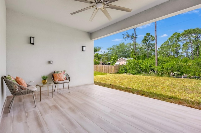 view of patio / terrace featuring ceiling fan