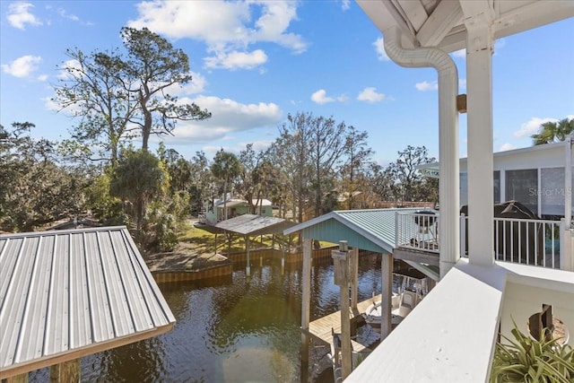 dock area with a water view