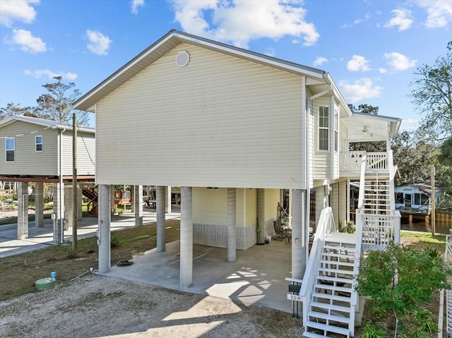 view of side of property featuring a carport