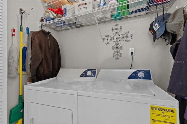 clothes washing area with independent washer and dryer