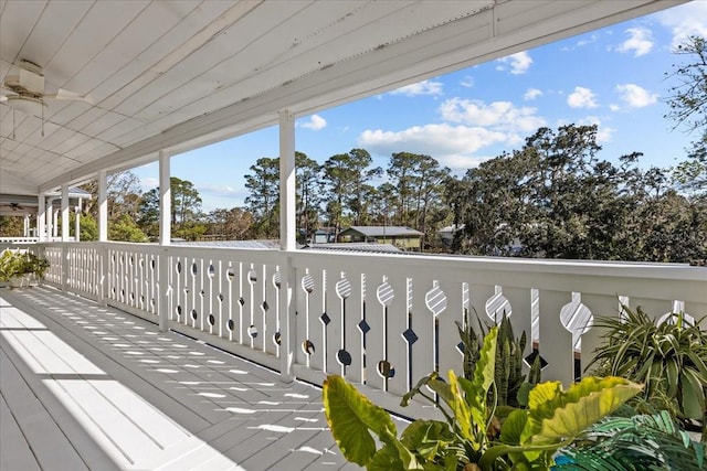 wooden deck with ceiling fan