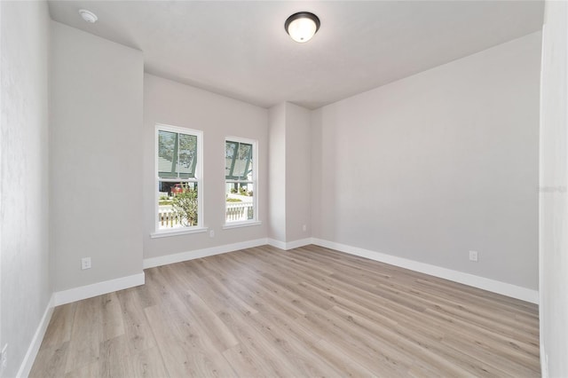 unfurnished room featuring light wood-type flooring