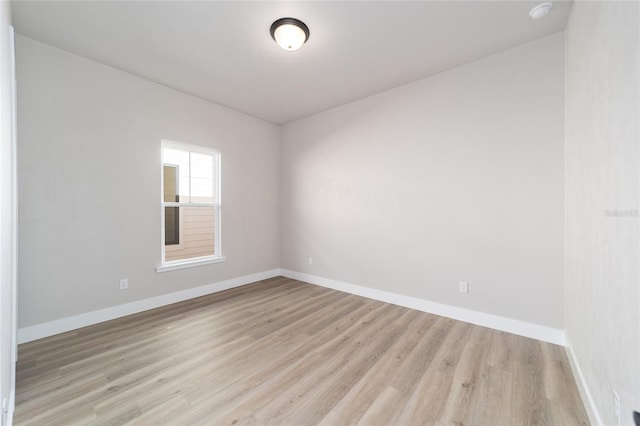 unfurnished room featuring light hardwood / wood-style flooring