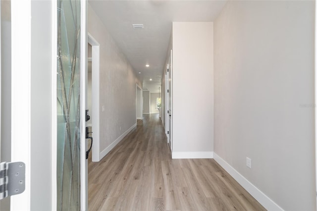 hall featuring light hardwood / wood-style floors