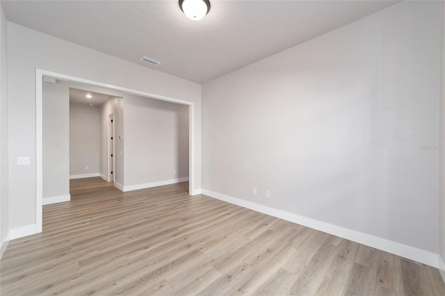 1069 NW 132nd Blvd, Newberry, FL 32669 - unfurnished room with wood finished floors and baseboards