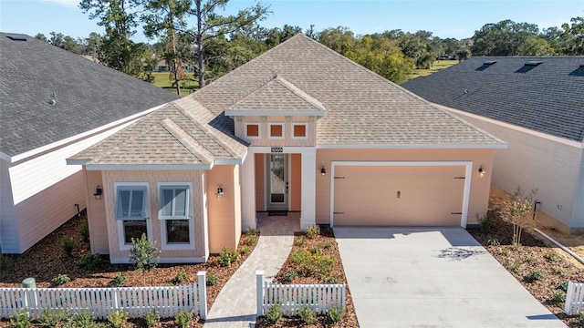 view of front of property with a garage