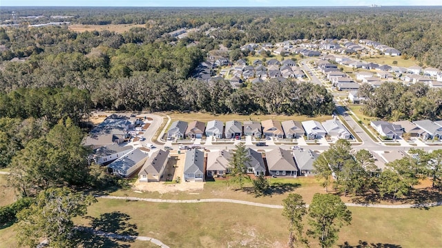 1069 NW 132nd Blvd, Newberry, FL 32669 - aerial view of property and surrounding area featuring nearby suburban area and a forest