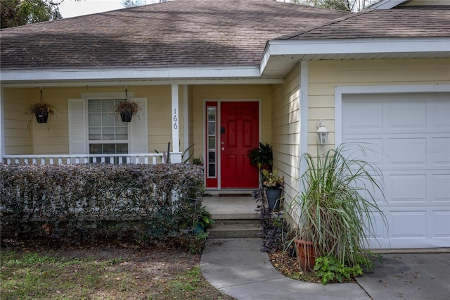 entrance to property featuring a garage