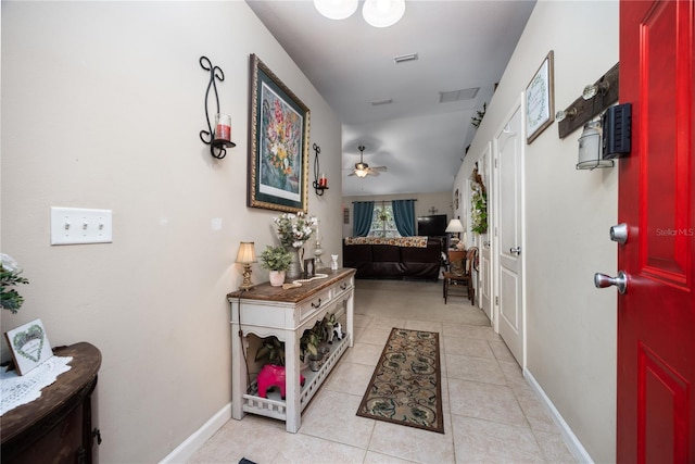 hall with light tile patterned flooring