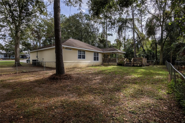 view of yard with a wooden deck