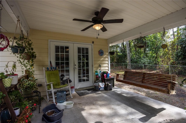 view of patio featuring ceiling fan and french doors