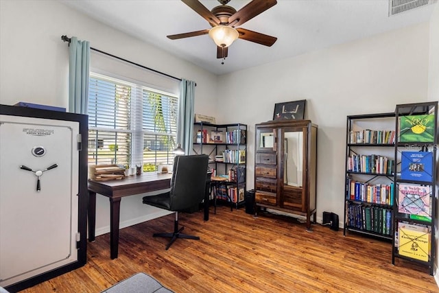 office featuring ceiling fan and wood-type flooring