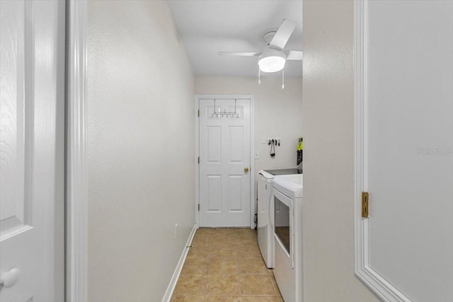 clothes washing area featuring washing machine and clothes dryer, ceiling fan, and light tile patterned flooring