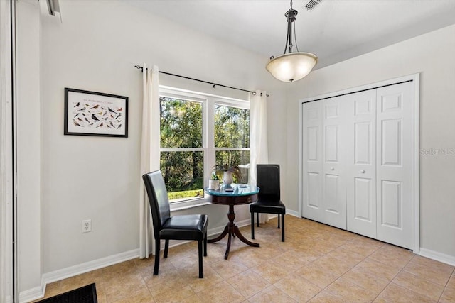 living area featuring light tile patterned floors