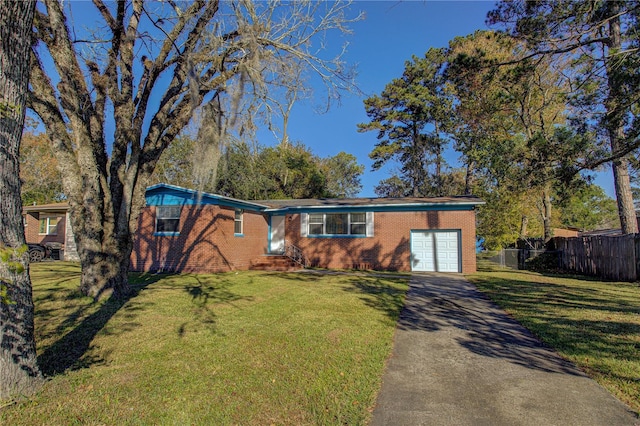 single story home featuring a front yard and a garage