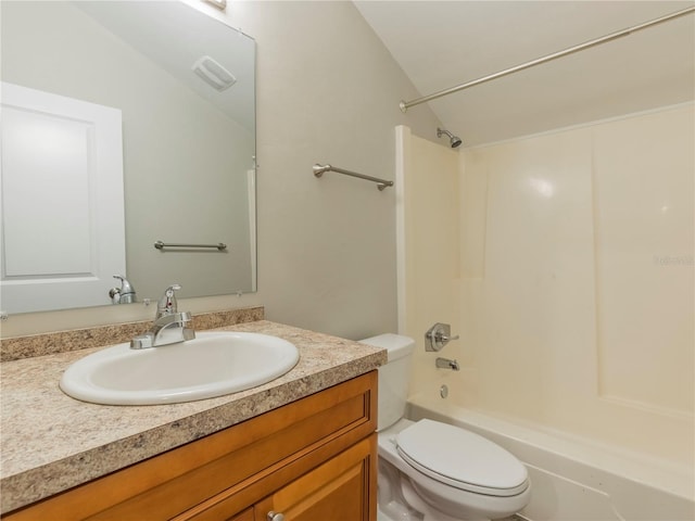 full bathroom featuring shower / bathing tub combination, vanity, toilet, and lofted ceiling