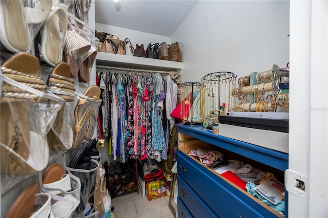 walk in closet featuring light tile patterned floors