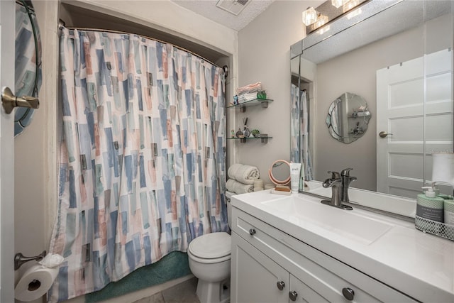 full bathroom featuring a textured ceiling, vanity, shower / bath combo with shower curtain, tile patterned flooring, and toilet