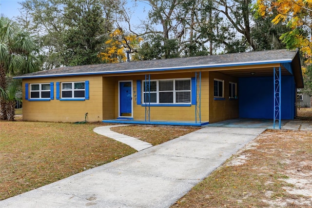 view of front of house with a carport