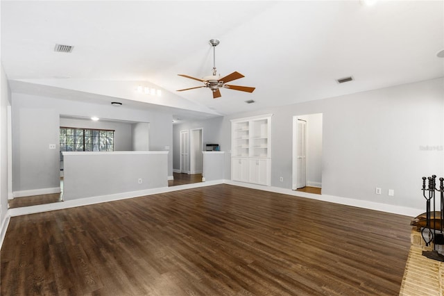 unfurnished living room with ceiling fan, built in features, dark wood-type flooring, and vaulted ceiling