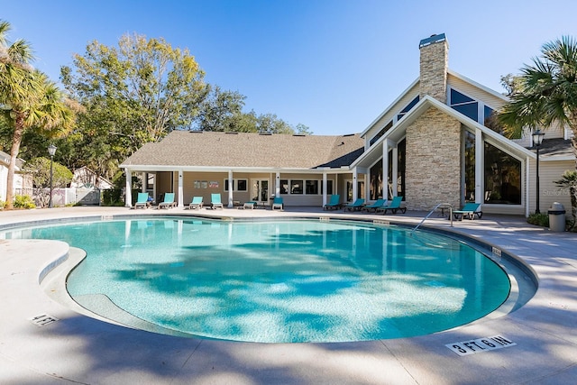 view of pool featuring a patio area