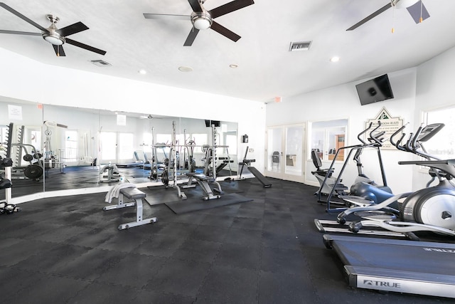 exercise room with ceiling fan