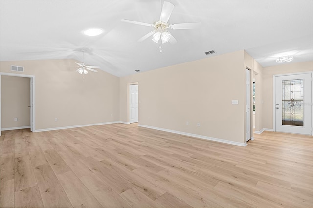 spare room with ceiling fan, light hardwood / wood-style floors, and lofted ceiling