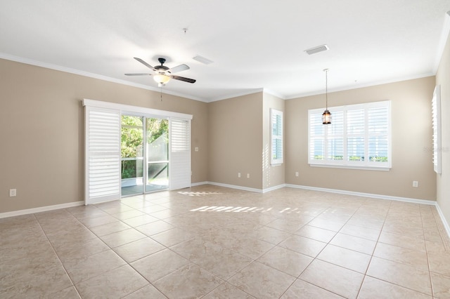 tiled empty room featuring plenty of natural light, ornamental molding, and ceiling fan