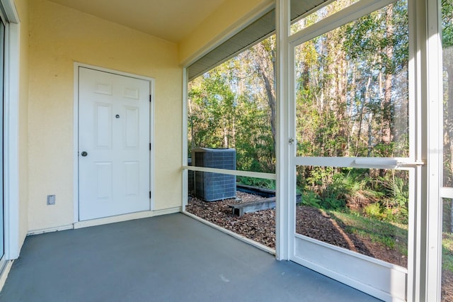 unfurnished sunroom featuring plenty of natural light