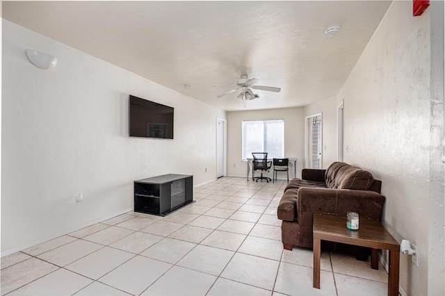 4000 SW 23rd St Unit 5-207, Gainesville, FL 32608 - living area featuring a ceiling fan and light tile patterned flooring