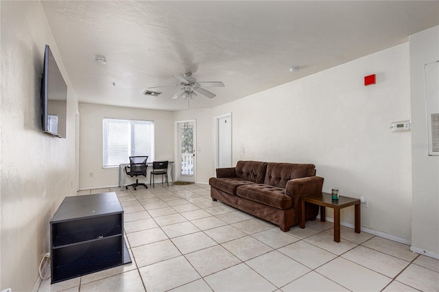 4000 SW 23rd St Unit 5-207, Gainesville, FL 32608 - living room featuring light tile patterned flooring and a ceiling fan