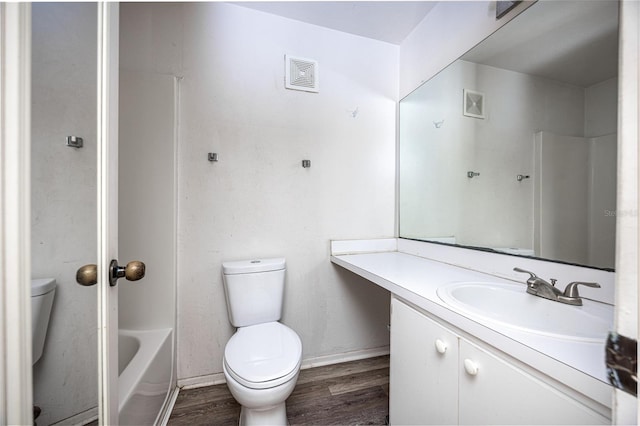 4000 SW 23rd St Unit 5-207, Gainesville, FL 32608 - bathroom featuring vanity and wood finished floors