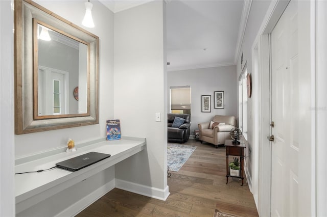 bathroom featuring crown molding and wood-type flooring