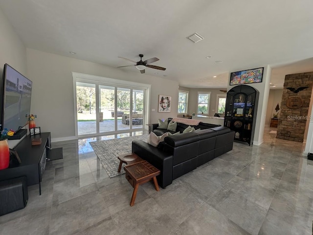 living room featuring ceiling fan