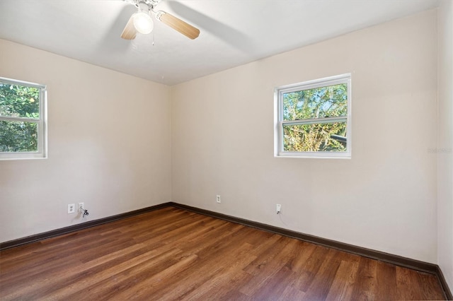 spare room featuring ceiling fan and wood-type flooring